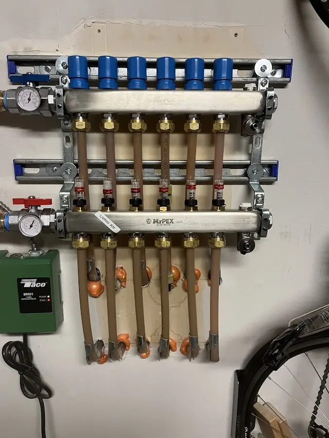 Plumber performing Water Heater Repair at a residential property in Mission Bend